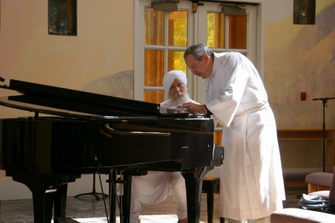 Pr Steve and his Sikh friend preparing for Worship at the piano in the Sanctuary.