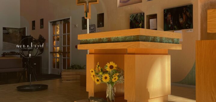 Photo of the Peace Altar before Worship, with sunflowers greeting the morning.