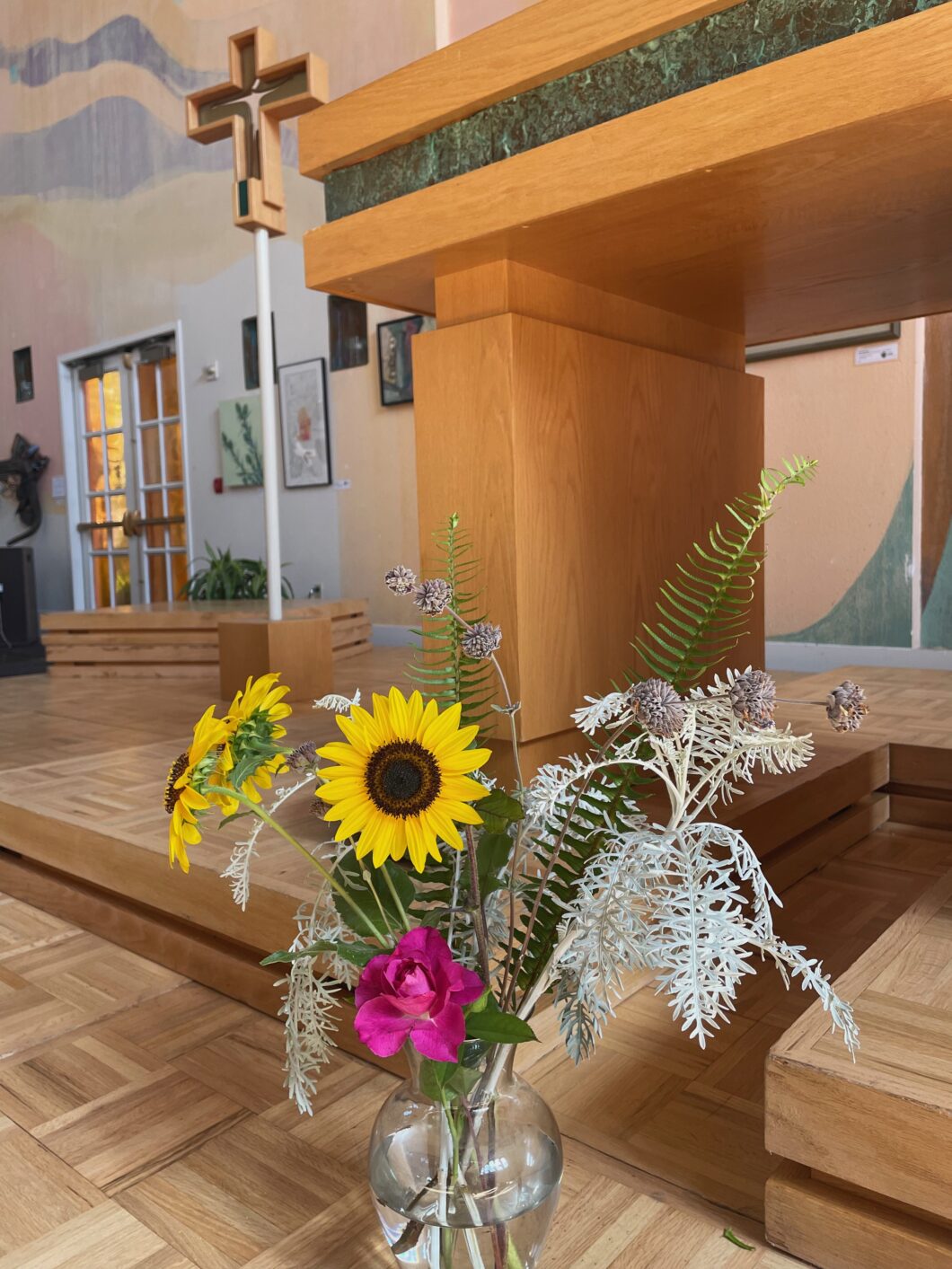 Photo of summer flowers in front of the Altar