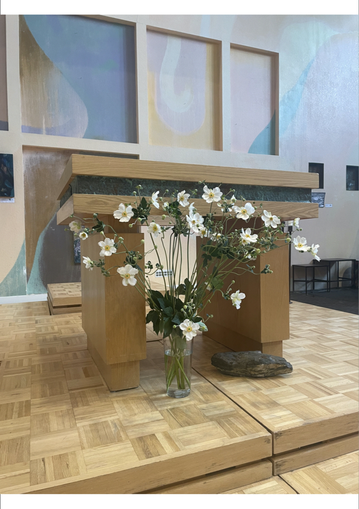 Summer flowers in front of the Peace Altar in the Sanctuary.