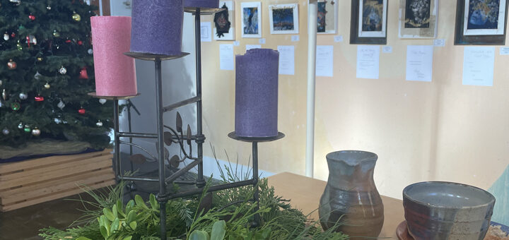 Photo of the Peace Sanctuary prepared for Worship with the Advent Wreath, Christmas Tree, Processional Cross, and Elements for Communion.