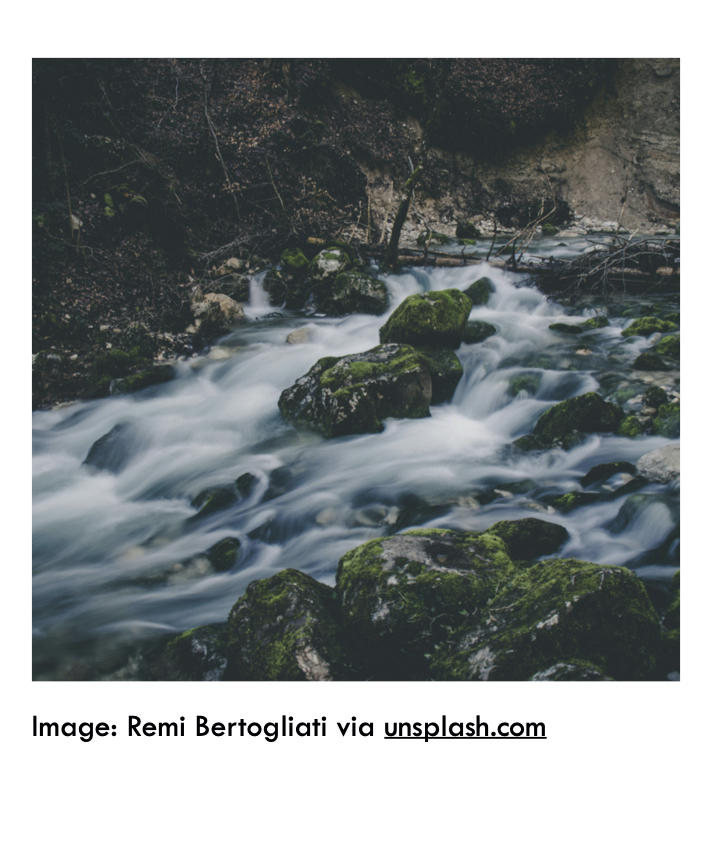 Photo of a flowing stream from Remi Bertogliati via Unsplash.com.