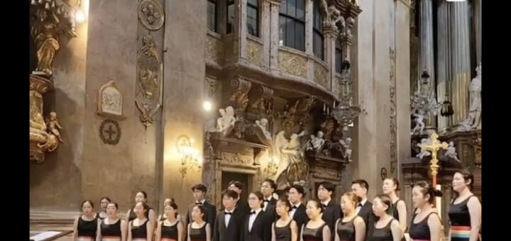 Photo of The Pacific Choir performing in Saint Peter's Church in Vienna, Austria, during their 2024 European Tour.