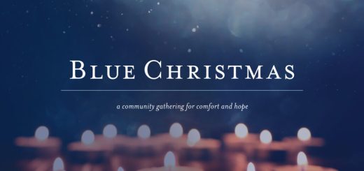 Blue background with several lit candles text Blue Christmas