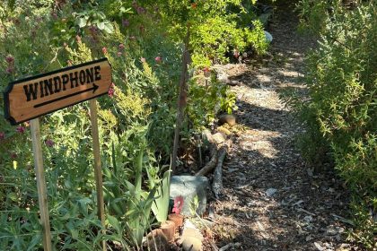 Worden sign directing people to the Wind Phone in Peace Forest of the Garden